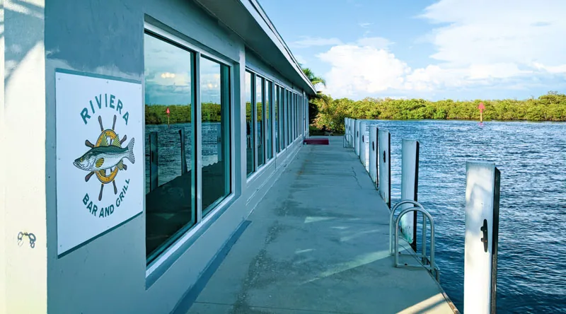 Dock and boat access alongside Riviera Bar & Grill