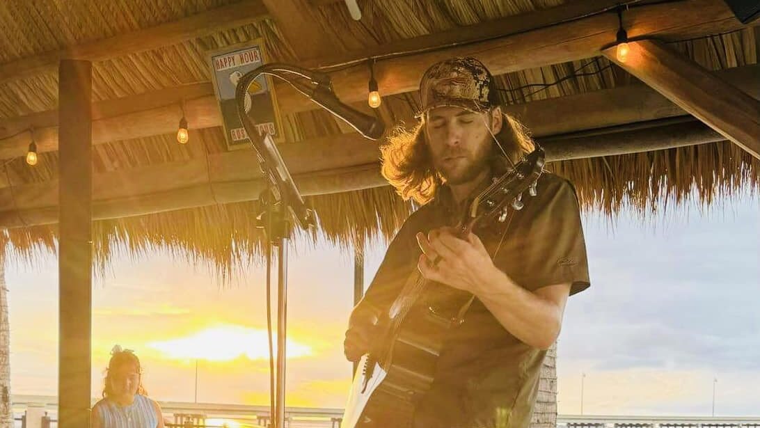 Luke Perring performing at Riviera Bar & Grill